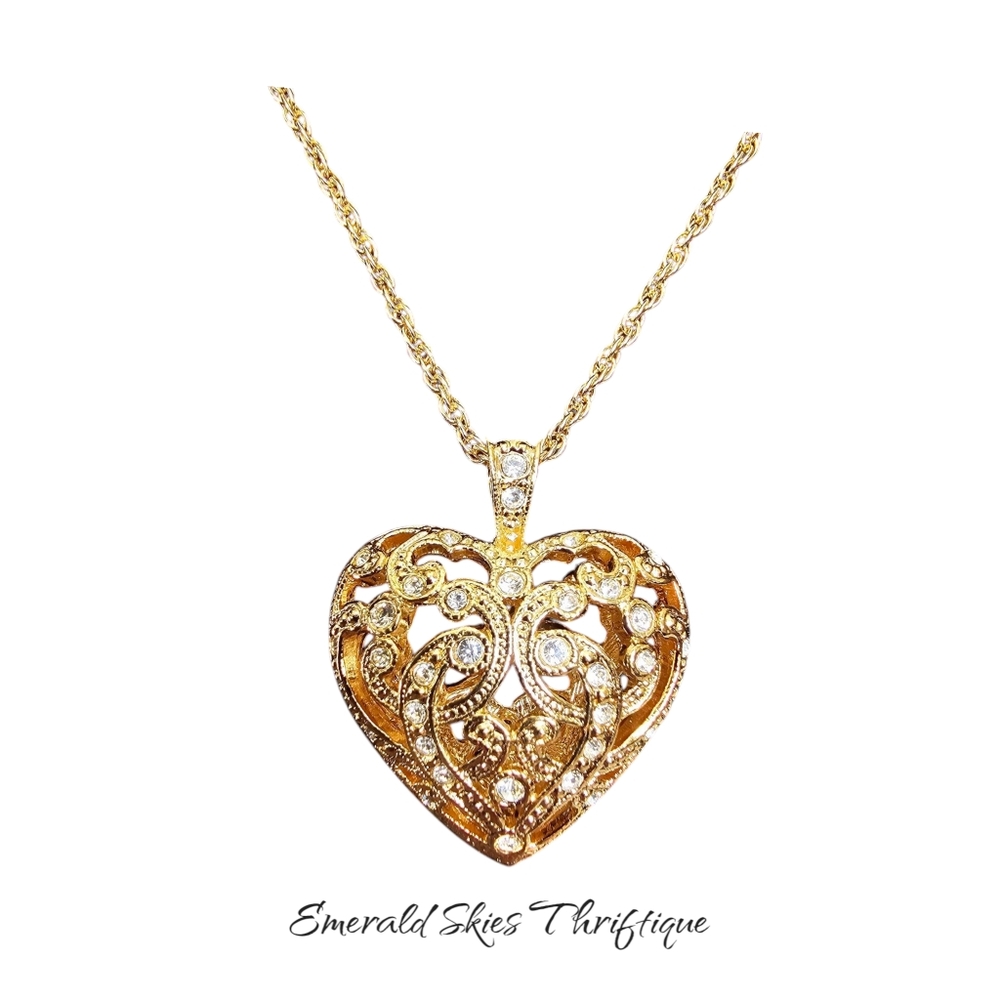 Avon open pave' heart necklace, new in box.